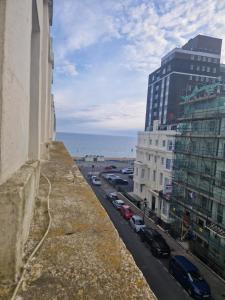 a view of a city with cars parked on a street at Brighton West Pier flat in Brighton & Hove