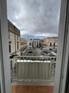 a balcony with a view of a parking lot at Antico castello BeB in Altamura