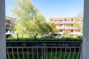 a view of a building from a balcony at oasi corallo in Diano Marina