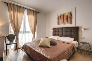 a bedroom with a large bed and a window at Villa Orion - Private Heated Pool, Sauna & Jacuzzi in Rovinj +77 photos