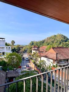 a view from a balcony of a city street at Coconut Suite Aonang in Ao Nang Beach