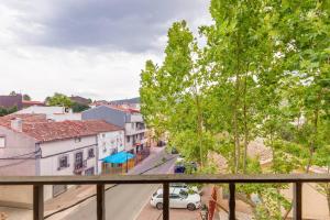 a view of a city street from a balcony at Precioso Apartamento a estrenar. La Placeta in Riópar