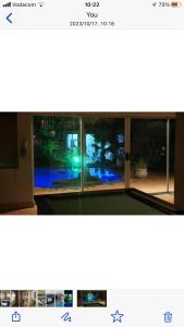 a picture of a window with a view of a yard at Junior Suite with Pool View - in Port Elizabeth