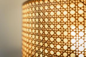 a close up of a curtain with gold dots at Thimo's Lakeview - Sunset near Interlaken in Leissigen