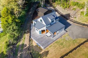 an overhead view of a house with a roof at Reotahi Bolthole in Whangarei Heads