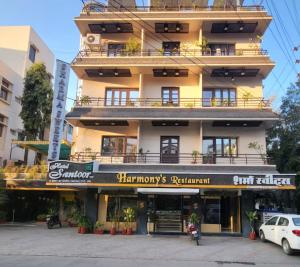 a building with a sign that reads harrys restaurant at Hotel Santoor - Geeta Bhawan Square in Indore