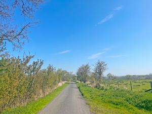 a dirt road in the middle of a field at Bradley House in Harrop Fold