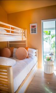 two bunk beds in a room with a window at Trentham Waters Resort in Gol Gol +26 photos