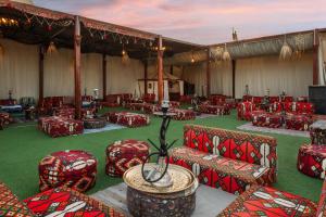a group of chairs and tables in a tent at Seagull Beach Resort - Families and Couples Only in Hurghada +120 photos
