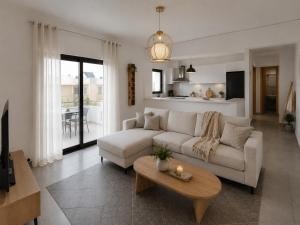 a living room with a white couch and a table at Villa Stefania Dream in Érfoi