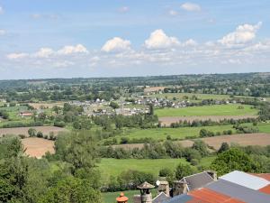 a view of a town from the roof of a house at Le Cygne 2eme etage in Avranches