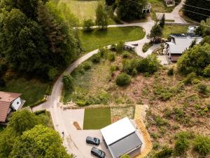 an aerial view of a truck parked on a road at Apartment Forstsee Ruhepol in Techelsberg am Worthersee +13 photos