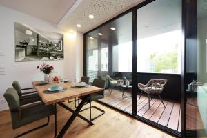 a dining room with a table and chairs at Alte Weberei in Marktredwitz