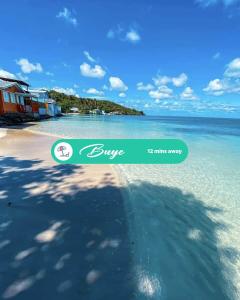 a picture of a beach with the words bryce minuteaway at 3.1 Near Beach • Generator • Hammock • 1BR in Garita +30 photos