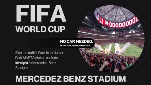 a poster for a soccer game in a stadium at Jade Junction in Atlanta