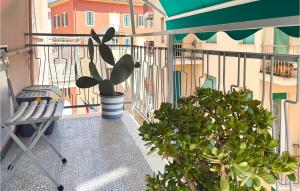 a balcony with a cactus and a plant on it at 2 Bedroom Awesome Apartment In Chiavari in Chiavari