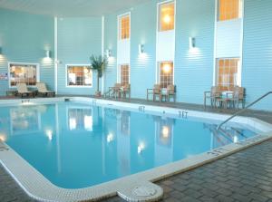 a large swimming pool in front of a building at Grand Beach Resort Hotel in Traverse City