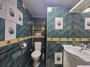 a bathroom with a toilet and a sink at Casa Di Kotor in Kotor