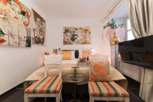 a dining room with a table and two chairs at Prijeko Palace in Dubrovnik +92 photos