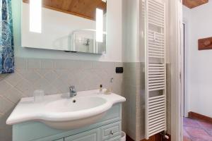 a bathroom with a sink and a mirror at Chez Duclos Bionaz in Bionaz +28 photos