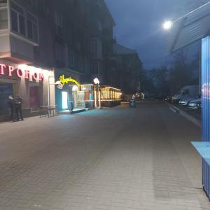 an empty street at night in a city at Центр,дитяче містечко Казка in Mykolaiv