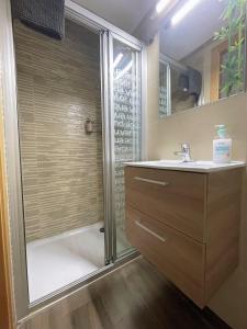 a bathroom with a shower and a sink at Casa junto al mar in Vinarós