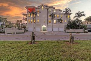 a large house with a fence in front of it at Admirals Watch - 673 in Siesta Key