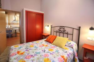 Postel nebo postele na pokoji v ubytování Apartamentos Bouso