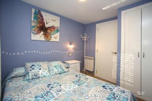 Postel nebo postele na pokoji v ubytování Apartamentos Bouso