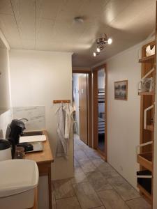 a bathroom with a sink and a toilet in a room at Holiday Guesthouse in Stykkishólmur +35 photos