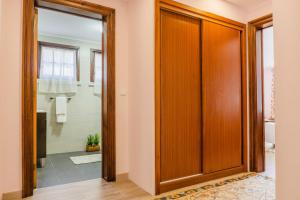 a bathroom with a shower and a glass door at Sun&Beach Retreat in Ponta Delgada +62 photos