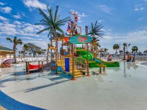 a water park with a playground with a slide at Ocean Lakes Walk to beach! Waterpark! Arcade! Dogs Welcome! in Myrtle Beach