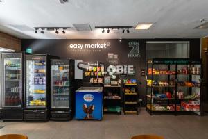 a store with two refrigerators in a store at Lobie Queen Ipanema in Rio de Janeiro +14 photos