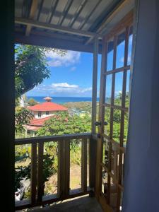 a view from the balcony of a house at CJ's Creole Hideaway in Castries +9 photos