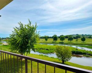 a view of a river from a balcony at Landmark Inn On The River Sevierville in Sevierville