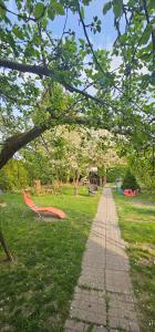 a brick path in a park with a playground at Rest & Relax Górzyniec in Piechowice