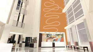a lobby of a building with a painting on the wall at The Arlin, Arlington, a Tribute Portfolio Hotel in Arlington