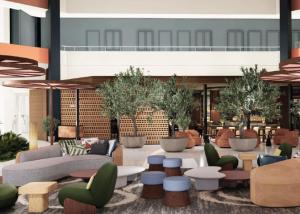 a lobby with couches and chairs and tables at The Arlin, Arlington, a Tribute Portfolio Hotel in Arlington +24 photos