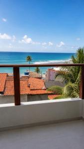 a view of the ocean from the balcony of a condo at Casas de Juan in Morro de São Paulo