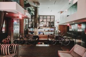 a lobby with bikes parked in a room at Nolitan Hotel SoHo - New York in New York