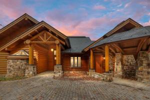 a log home with a gambrel roof at Hamatreya- Panoramic Shenandoah Views in Rileyville