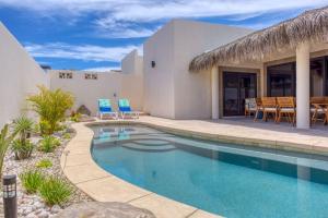 a villa with a swimming pool and a patio at Walkable Convenient in Downtown Los Barriles in Los Barriles