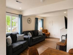 a living room with a couch and a table at Alhonna Resort in Lake Ozark