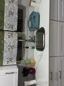 a bathroom with a mirror and a towel rack at Odette Retreat in Braeton +6 photos