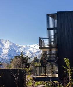 a house with a view of the mountains at Pueblo La Dehesa in Santiago