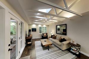 a living room with a couch and a table at Woodinville Escape in Woodinville