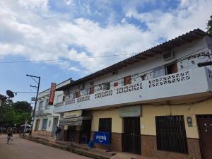 a building on the side of a street at Hostal Princesa Katia in Necoclí