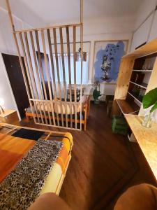 a living room with a chair and a couch at LodelaAbuela 3 in Ciudadela