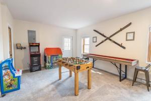 a living room with a table and a chess board at Whiskey Ridge in Boone