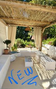 a sign that says love written on a patio at Villa Dèco Monopoli in Monopoli
